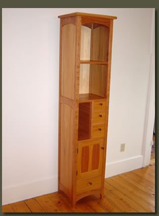 The grace and beauty of our Cabot Tower comes from the harmonious pairing of uniquely beautiful woods: Cherry, Reclaimed Old Growth Cypress, and Reclaimed Old Growth Redwood